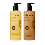 Two bottles of Bolden Shea Oil with pump dispensers on a white background