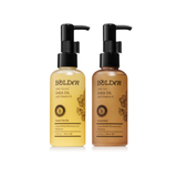 Two bottles of mini Bolden shea oil with pump dispensers on a white background