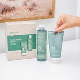 Bolden cleansing duo set with a hand holding the cleanser