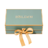 Green gift box with gold ribbon and 'BOLDEN' branding on a white background