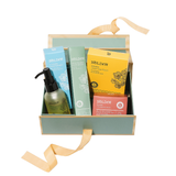 Set of Bolden skincare products in a box with a ribbon on a white background